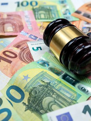 rule of law and auctions with judge's gavel and euro banknotes. Crime concept